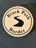 Black Path leather badge